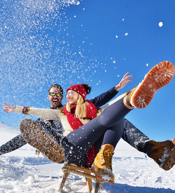Couple having fun in snow