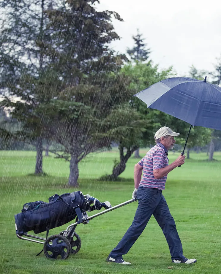 Golfer in the rain