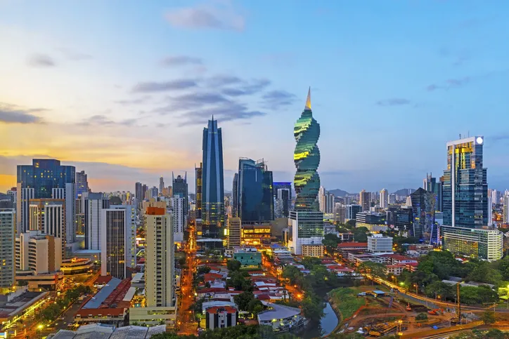 The skyline of Panama City with its skyscrapers in the financial district at sunset, Panama.
