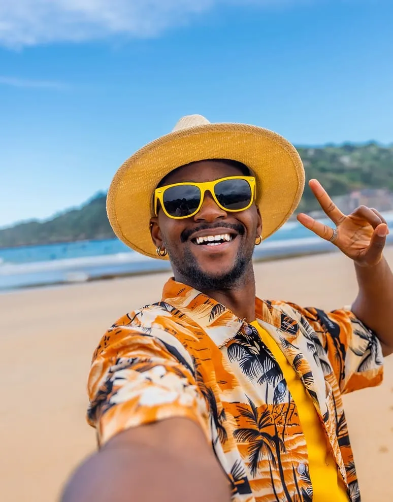 Man at the beach under sun