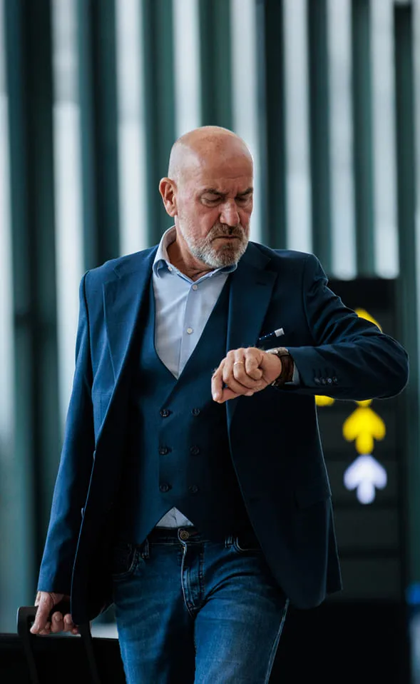 man looking at his watch