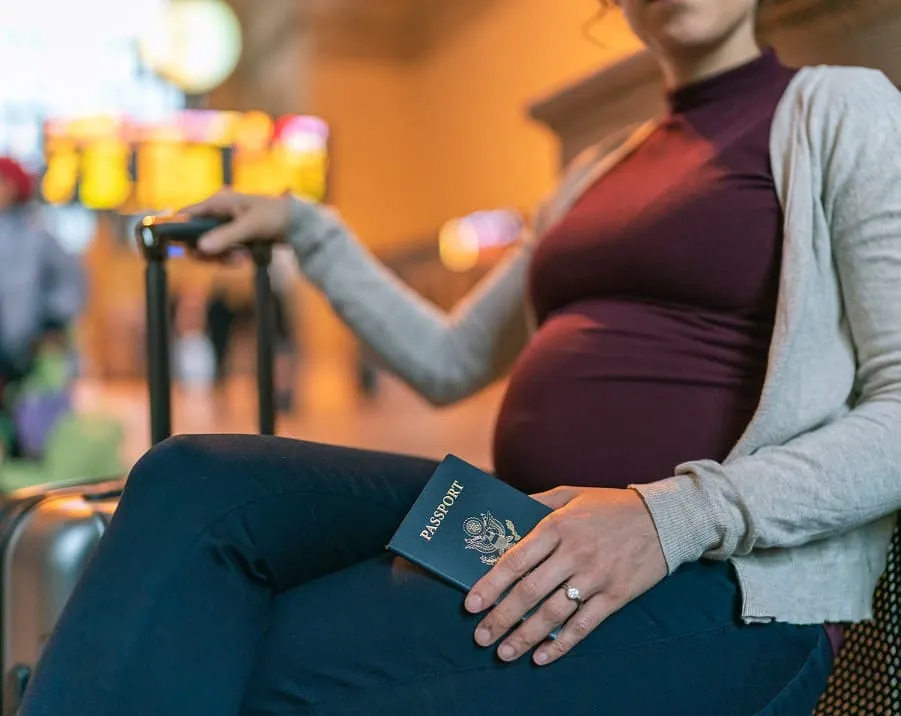 pregnant woman taking the plane