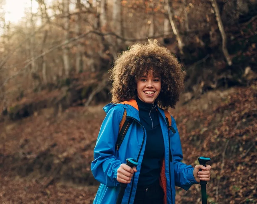 Woman alone walking in forest