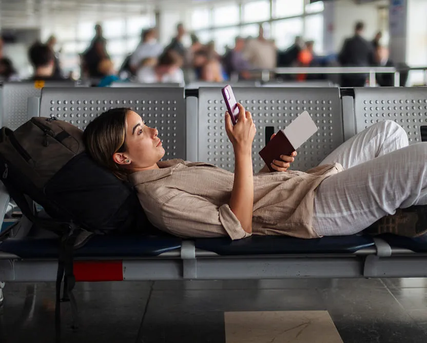 Woman at airport cancelling trip